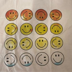 Oversized white t-shirt with rainbow smiley faces